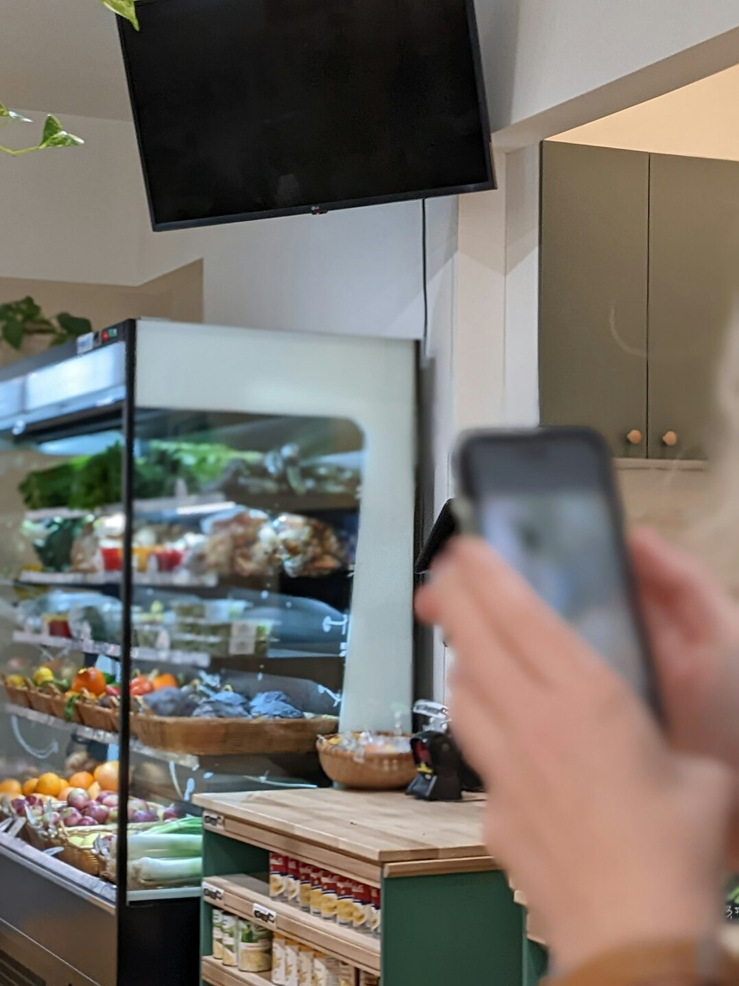 retail store employee watching monitor