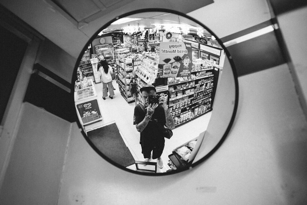 store detective observing customer