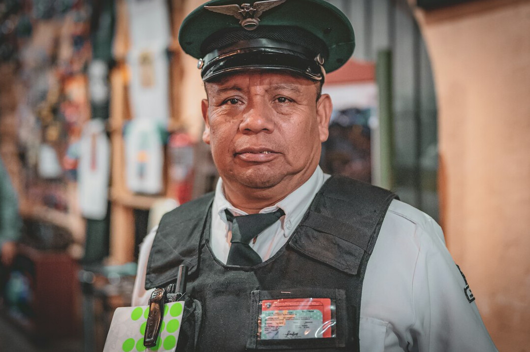 store detective watching customers
