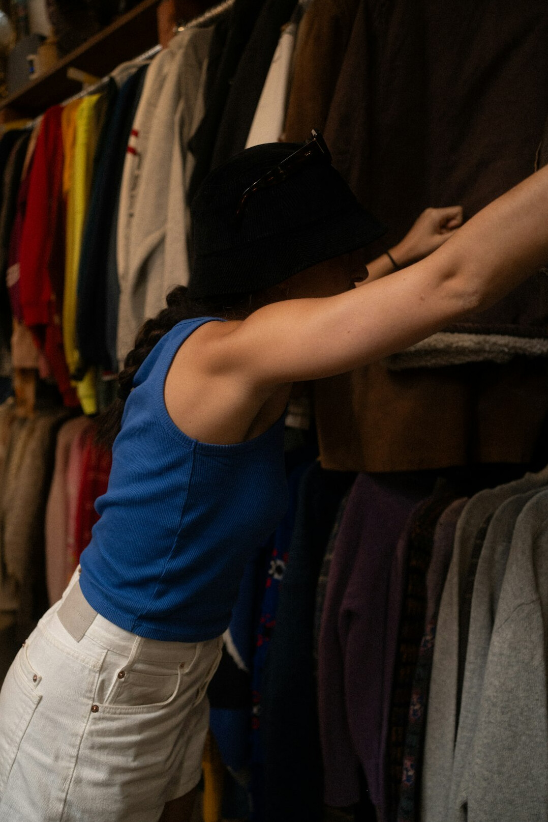woman shoplifting clothes