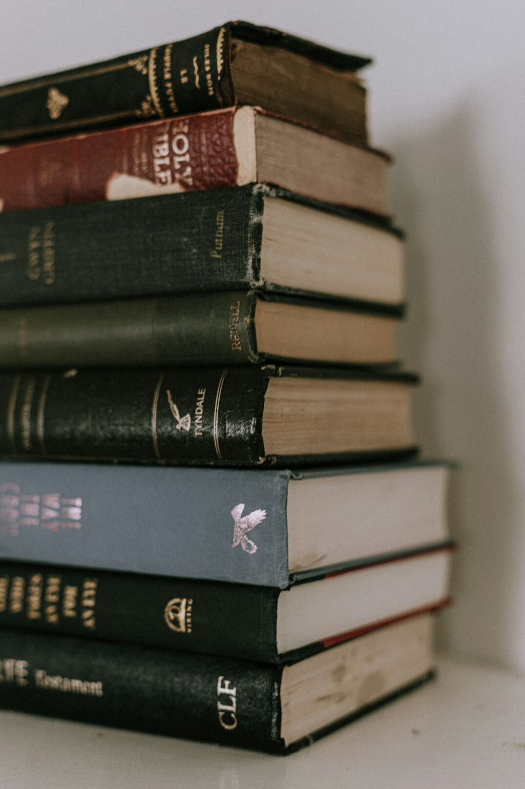 Stack of old books on a table