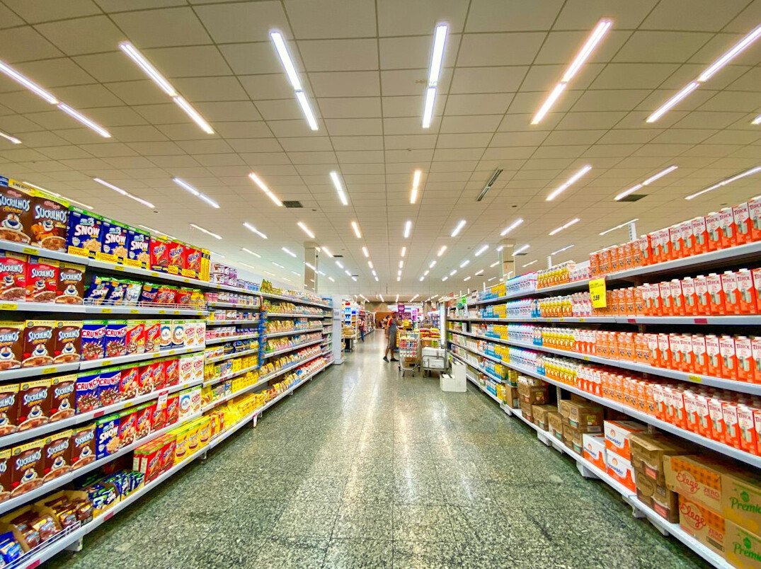 store detective monitoring supermarket